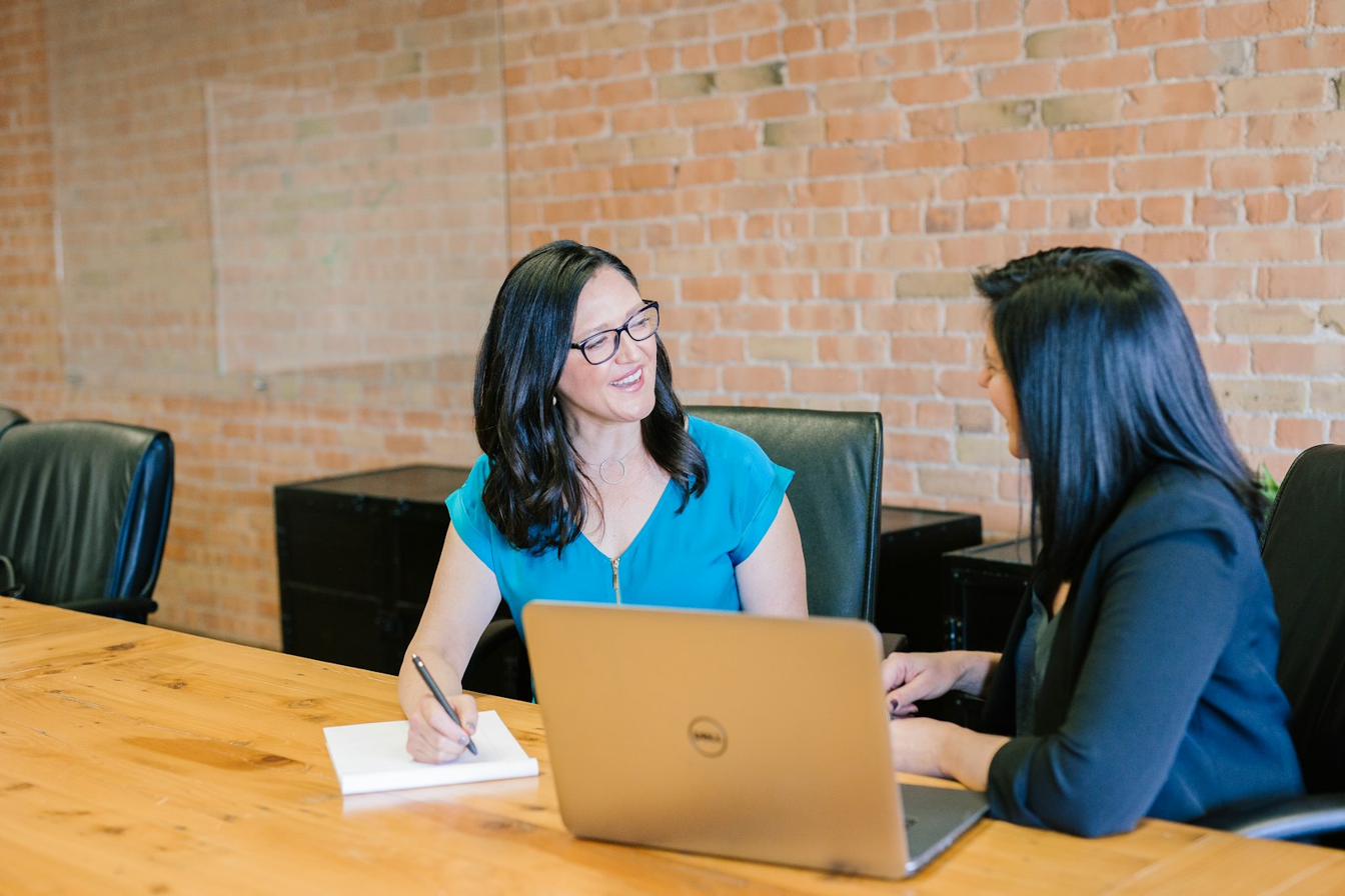 A Wealth Mentor working through a financial plan with a client