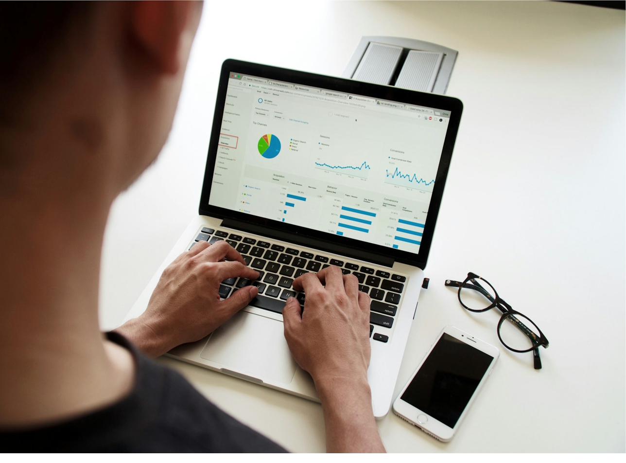 A young professional building their wealth with a laptop and a clear plan